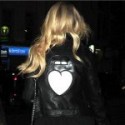 Lottie Moss Wearing Black Leather Jacket at Party